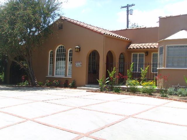 Concrete patio with brick bands